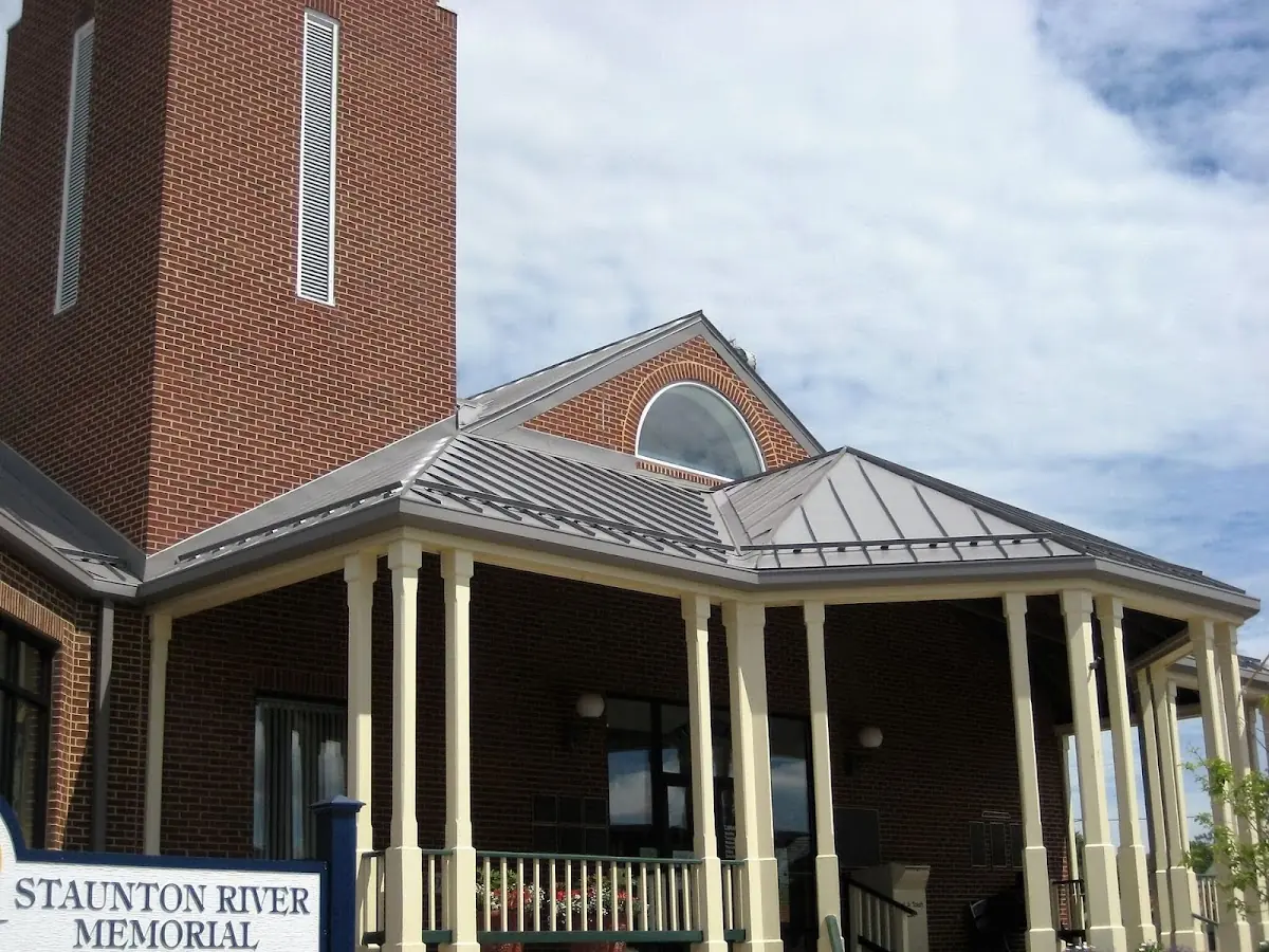 Skilled roofing craftsmen working on a residential roof in Newberry